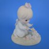 Precious Moments Figurine "God Bless You for Touching My Life"