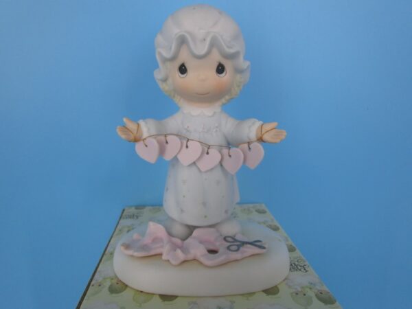 Precious Moments Figurine - You Have Touched so many Hearts