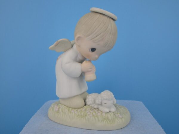 Precious Moments Figurine - God's ray of Mercy