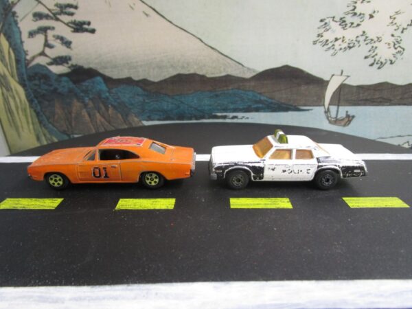 ERTL Dukes of Hazzard General Lee Dodge Charger and Matchbox Superfast No. 10 Plymouth Gran Grand Fury Police Car