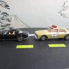 Kidco Pontiac Firebird Trans Am Black Gold Bird and ERTL 1980 Pontiac Bonneville Police Car