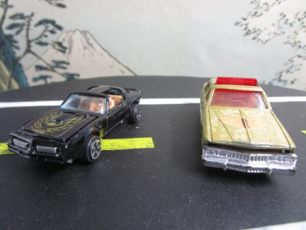 Kidco Pontiac Firebird Trans Am Black Gold Bird and ERTL 1980 Pontiac Bonneville Police Car - Image 2