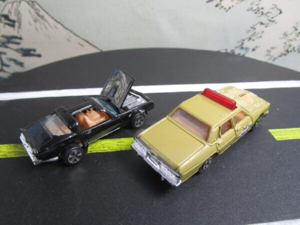 Kidco Pontiac Firebird Trans Am Black Gold Bird and ERTL 1980 Pontiac Bonneville Police Car - Image 6