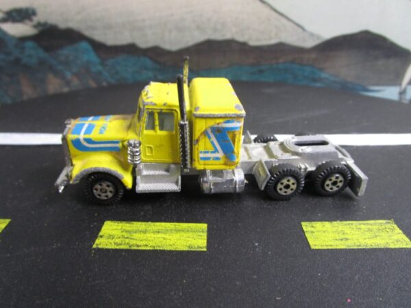 YATMING Yellow "Heavy Iron" Kenworth Semi Truck