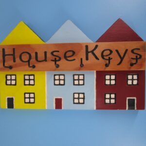 1. Handmade “House Keys” Wooden Key Holder